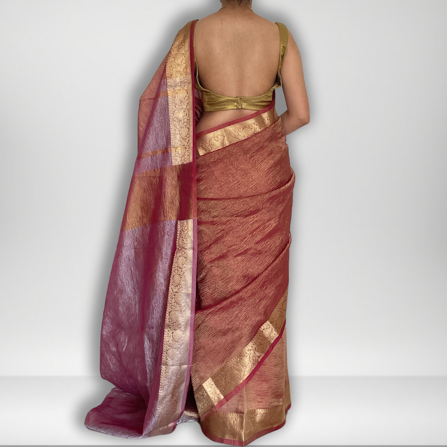 Pink crush tissue saree with Banarasi border and golden zari work, Work by Shobhangini. Elegant pink saree, perfect for feminine charm.