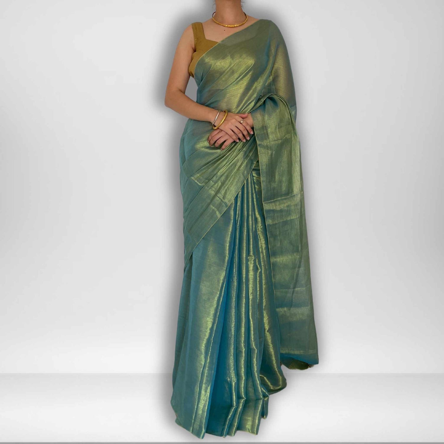 Tarana, Blue Raga Cotton Tissue Saree with Golden Zari Work by Shobhangini
