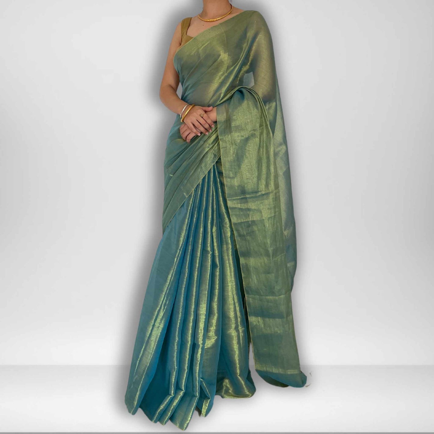 Tarana, Blue Raga Cotton Tissue Saree with Golden Zari Work by Shobhangini