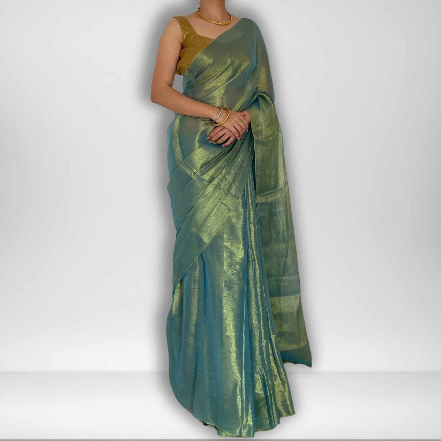 Tarana, Blue Raga Cotton Tissue Saree with Golden Zari Work by Shobhangini