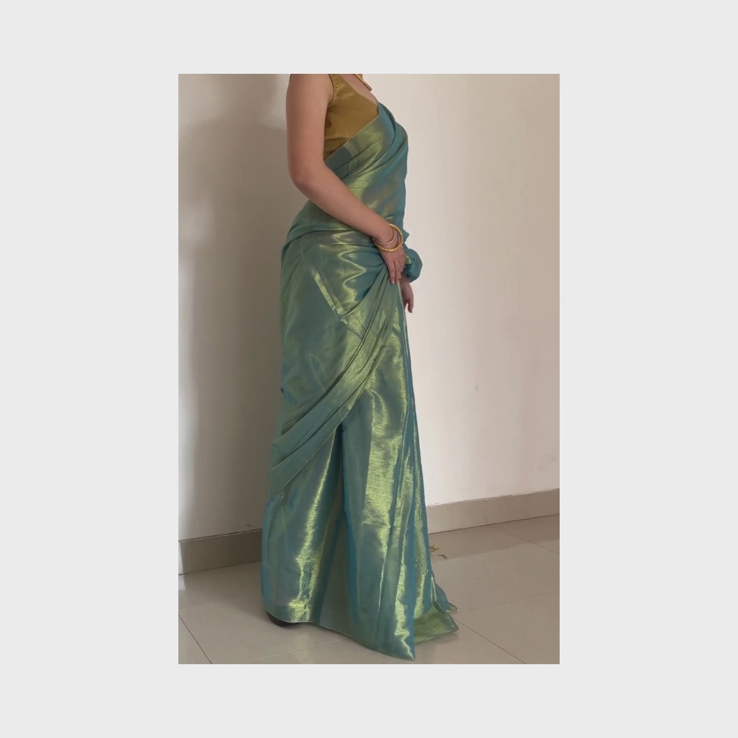 Tarana, Blue Raga Cotton Tissue Saree with Golden Zari Work by Shobhangini